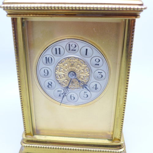 937 - A brass and four glass sided carriage clock with repeater, movement a/f