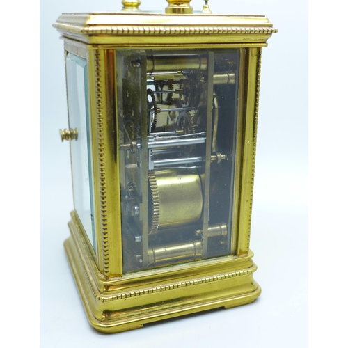 937 - A brass and four glass sided carriage clock with repeater, movement a/f