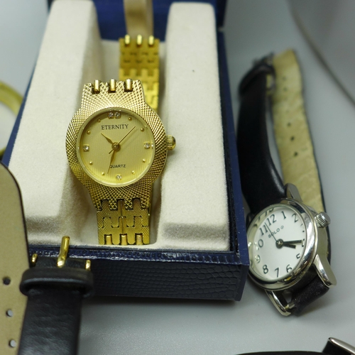 945 - Two bags of lady's and gentleman's wristwatches