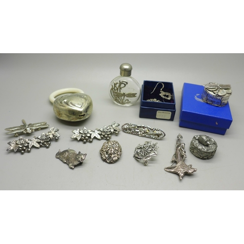 947 - A collection of brooches, a Silver Scenes pill box, baby's teething ring, etc.