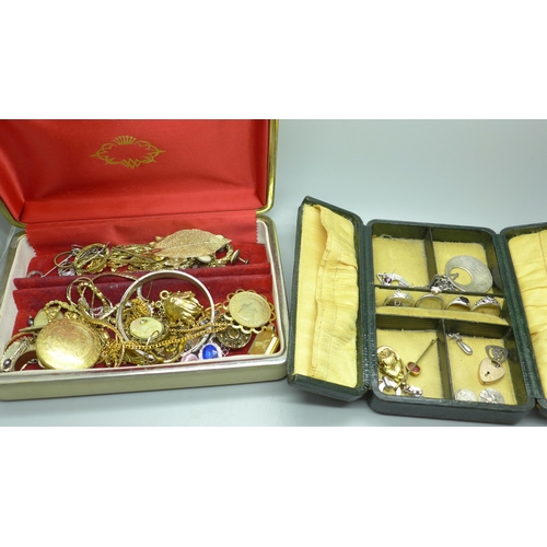 965 - Two boxes containing silver rings, charms and costume jewellery