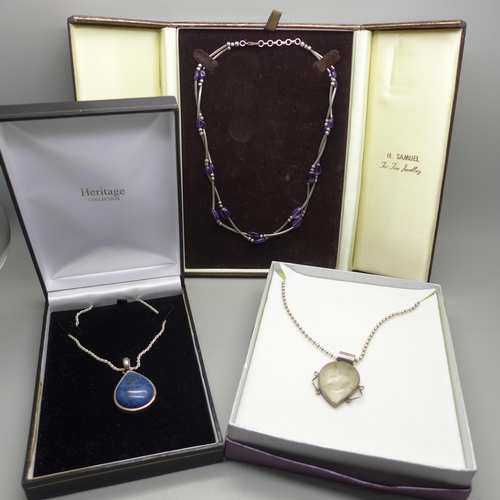 968 - A silver and amethyst necklace and two silver and gemstone pendants and chains