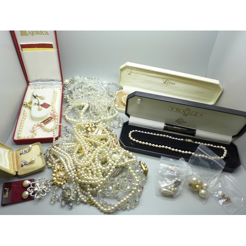 972 - A collection of costume jewellery and faux pearl necklaces