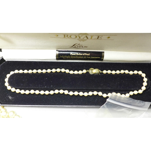 972 - A collection of costume jewellery and faux pearl necklaces