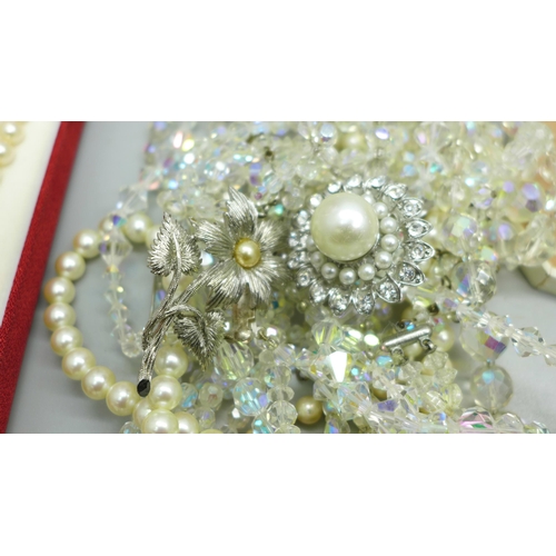 972 - A collection of costume jewellery and faux pearl necklaces