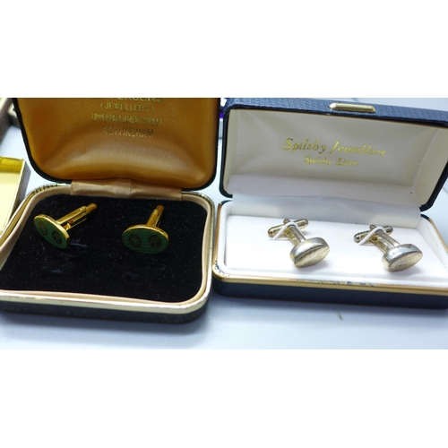 973 - Two boxes containing silver rings, charms and costume jewellery