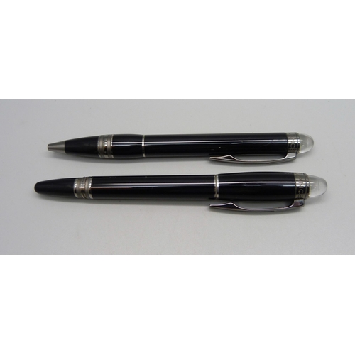 1001 - Two Mont Blanc StarWalker pens - a roller ball and a ball point, some fine cracks and marks to casin... 