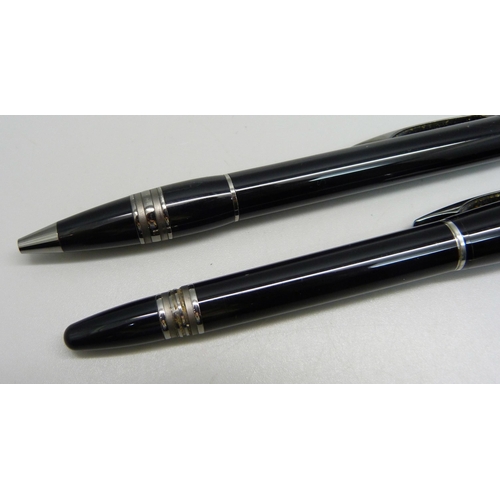 1001 - Two Mont Blanc StarWalker pens - a roller ball and a ball point, some fine cracks and marks to casin... 