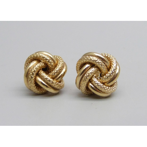 1017 - A pair of 9ct gold knot design stud earrings, 1.5g, 1cm knot