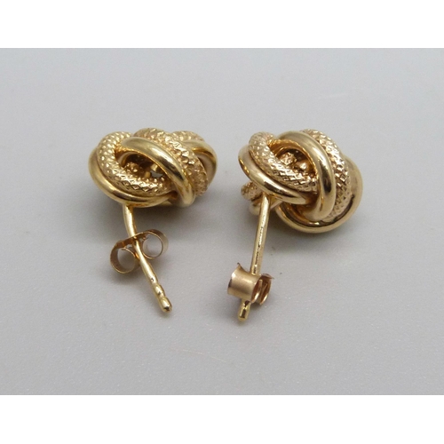 1017 - A pair of 9ct gold knot design stud earrings, 1.5g, 1cm knot