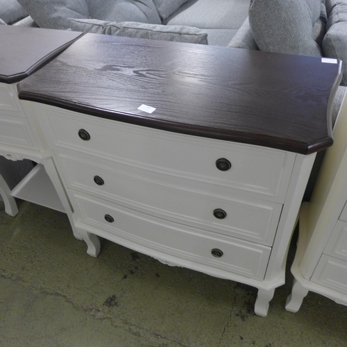 1548 - A white three drawer chest with contrast top