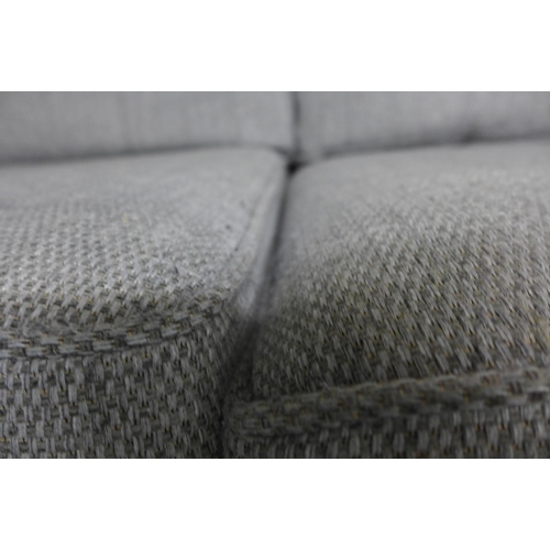 1560 - A pair of grey textured weave upholstered 2+3 seater sofas - damaged