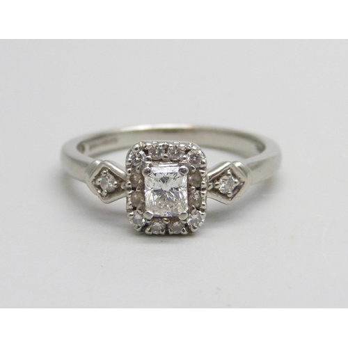 1027 - A platinum ring set with diamonds, Emmy London, 0.5ct, 3g, O, with associated box