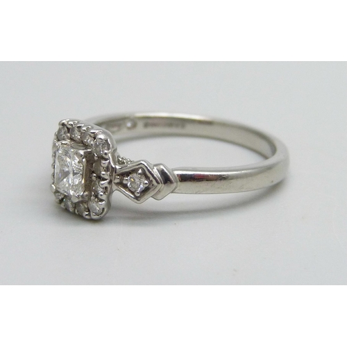 1027 - A platinum ring set with diamonds, Emmy London, 0.5ct, 3g, O, with associated box