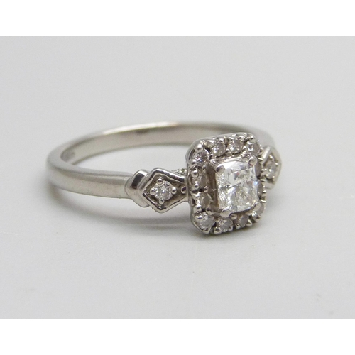 1027 - A platinum ring set with diamonds, Emmy London, 0.5ct, 3g, O, with associated box