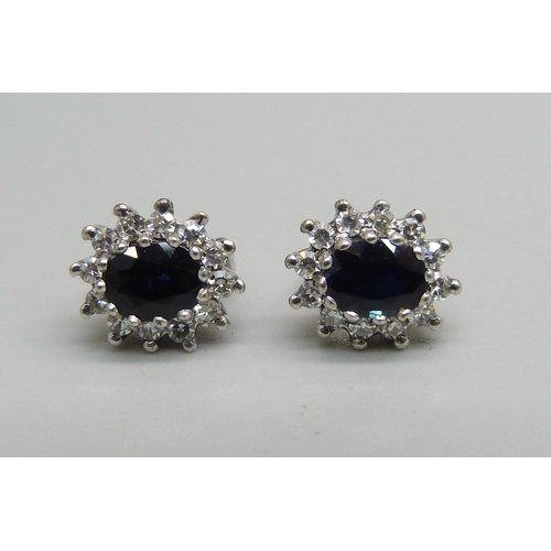 1028 - A pair of 9ct gold, sapphire and diamond earrings, 2.7g, 1cm clusters