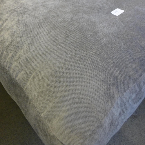 1582 - A grey velvet upholstered cushion topped foostool