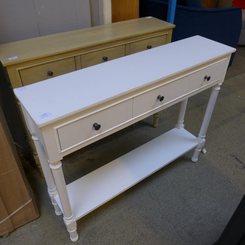 1588 - A white three drawer console table