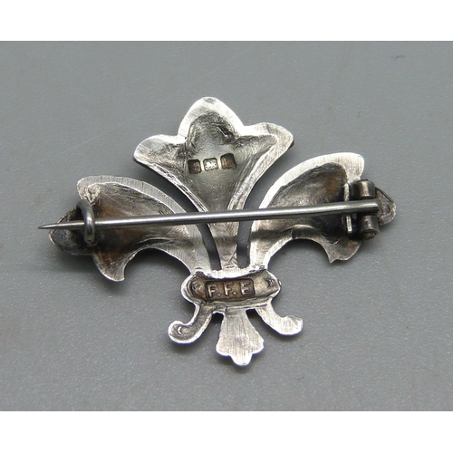 1031 - A silver and enamel suffragette fleur-de-lys brooch, enamel a/f