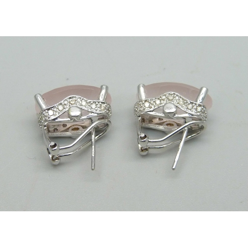 1033 - A pair of 14ct white gold and faceted cut rose quartz earrings, the sides set with diamonds, 8g, 1.5... 