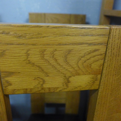 1623 - A set of four oak dining chairs