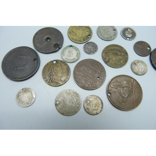 1038 - A collection of assorted British and foreign coinage, drilled