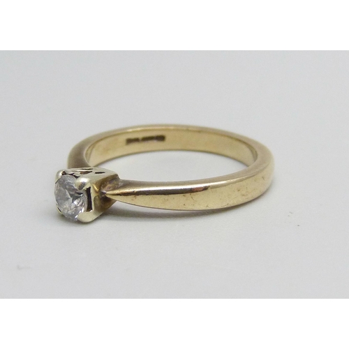 1041 - A 9ct gold and diamond solitaire ring, 2.3g, I