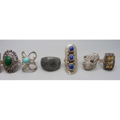 1055 - Ten chunky large silver rings set with citrine, turquoise, malachite, emerald, sapphire, ruby, etc.,... 