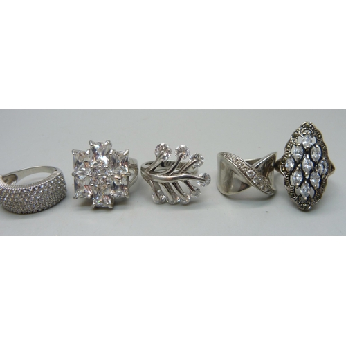 1059 - Nine chunky large silver rings set with cubic zirconia, quartz and marcasite, up to 30mm, 82g