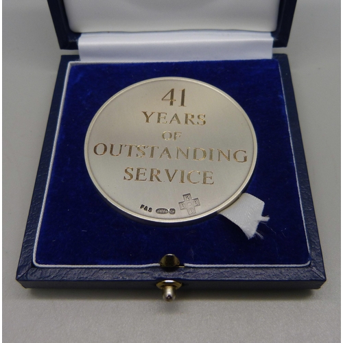 1061 - A silver long service medallion issued by Rolls-Royce, engraved 41 Years of Outstanding Service, Bir... 