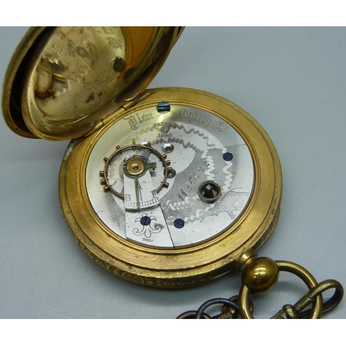 1064 - An early 20th Century Swiss made pocket watch in gold tone case, the inner case marked Awarded 6 Pri... 