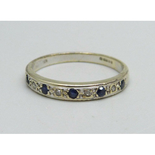 1070 - A 9ct gold ring set with sapphires and diamonds, 2.2g, O