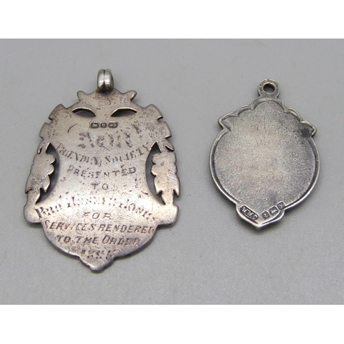 1075 - Two silver fobs, larger measures 4.5cm, 22g