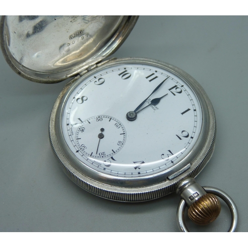 1080 - A silver cased full hunter pocket watch