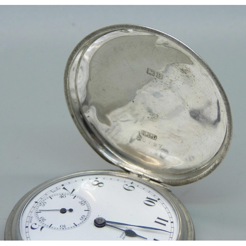 1080 - A silver cased full hunter pocket watch