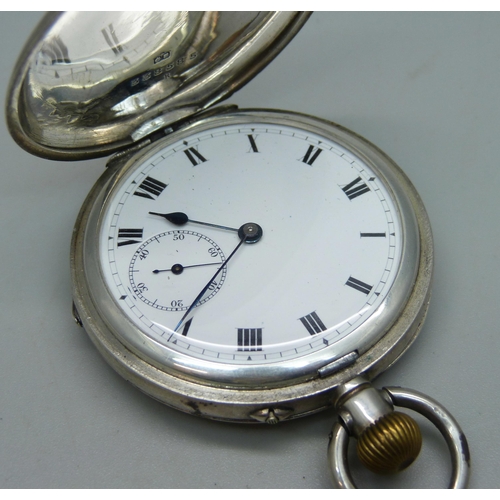 1083 - A silver cased full hunter pocket watch