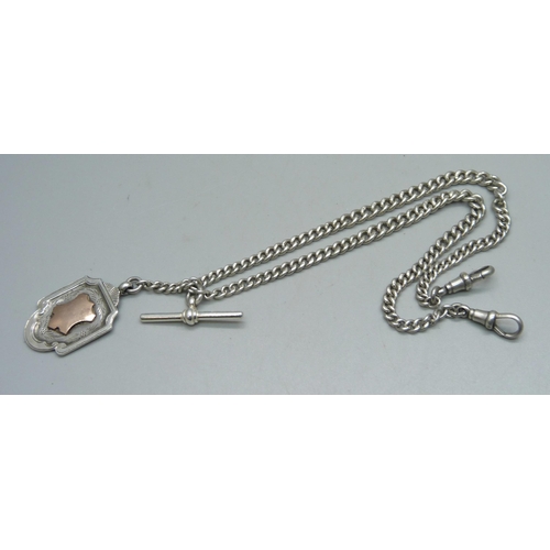 1090 - A silver double Albert chain and fob, 27g, 38cm including clips