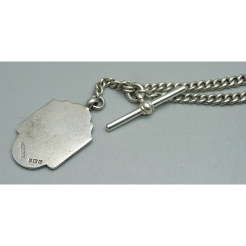 1090 - A silver double Albert chain and fob, 27g, 38cm including clips