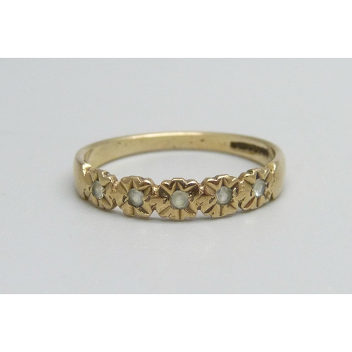 1094 - A 9ct gold ring set with five white stones, 1.6g, O