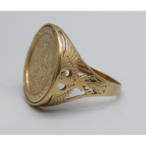 1096 - A 9ct gold ring with a 'St George' plaque, 4.2g, W