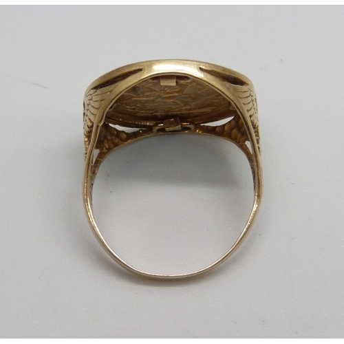 1096 - A 9ct gold ring with a 'St George' plaque, 4.2g, W