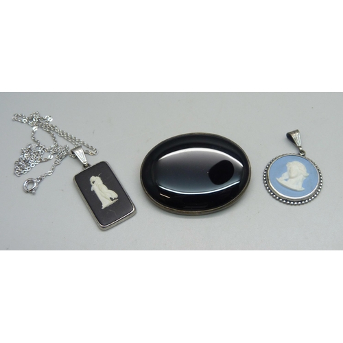 1101 - Three silver mounted pendants including two Wedgwood jasperware, one on a silver plated chain