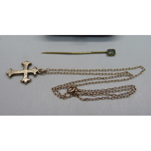 1102 - A gold plated cross pendant on a yellow metal chain, a yellow metal and seed pearl bird brooch, boxe... 