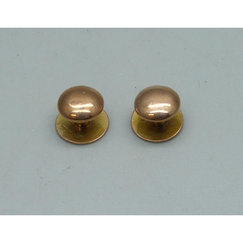 1107 - Two 9ct gold collar studs, 1.6g