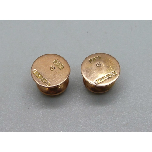 1107 - Two 9ct gold collar studs, 1.6g