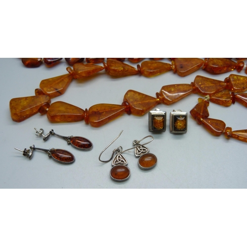 1112 - Three amber necklaces, one clasp a/f, three pairs of white metal and amber earrings, and one pair ma... 