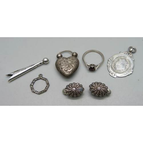 1119 - A collection of silver and white metal jewellery including a pair of silver clip on earrings, silver... 