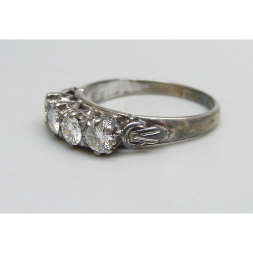 1120 - A platinum, four stone diamond ring, approximately 0.80ct diamond weight, 2.8g, M/N