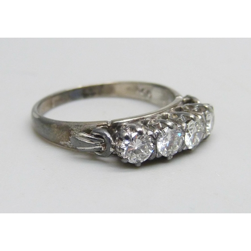 1120 - A platinum, four stone diamond ring, approximately 0.80ct diamond weight, 2.8g, M/N