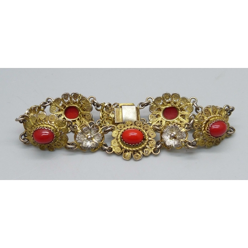 1139 - An .800 silver gilt bracelet set with coral, 15.5g,